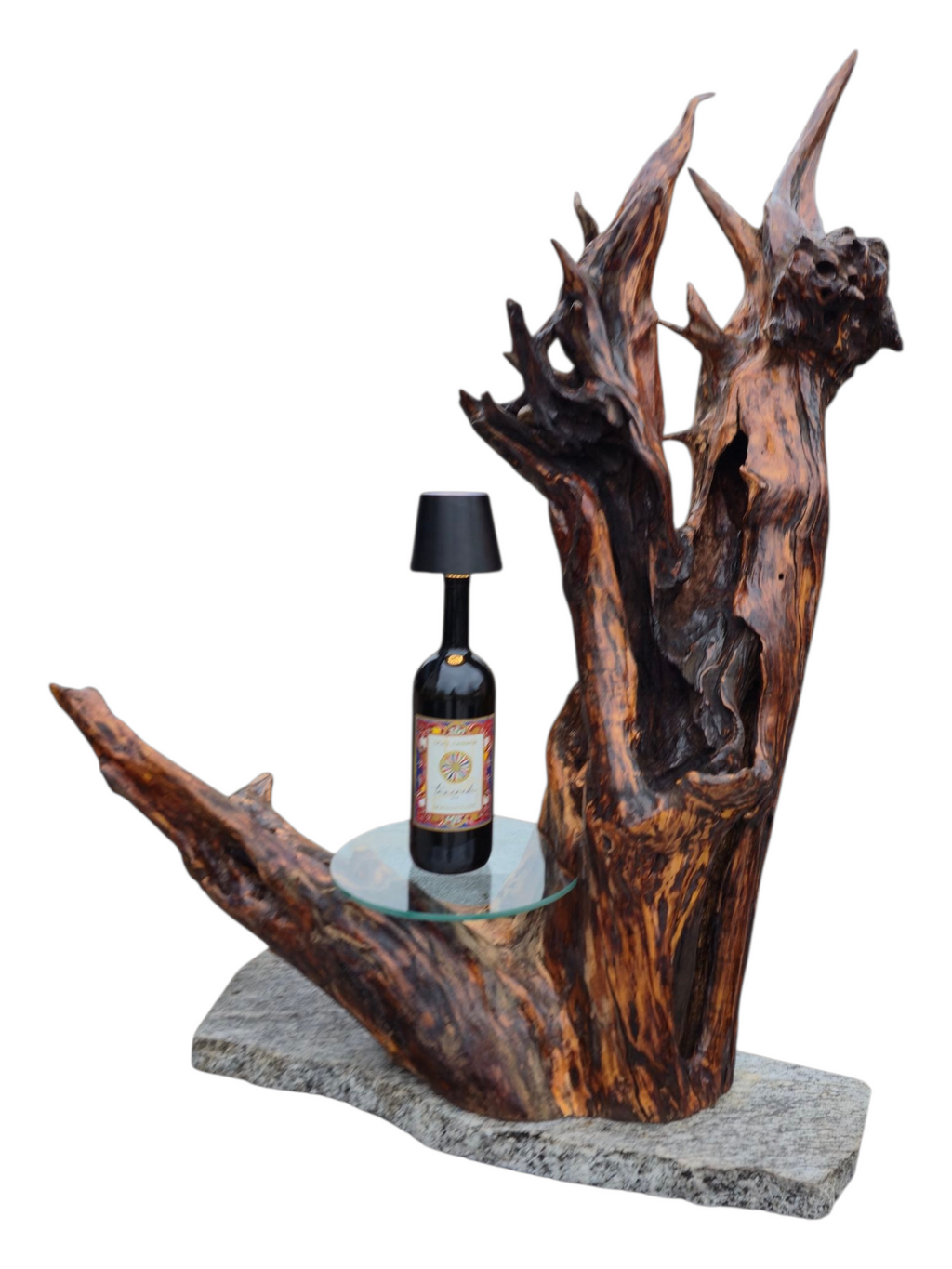 Scultura luminosa in radice naturale con ripiano in vetro.